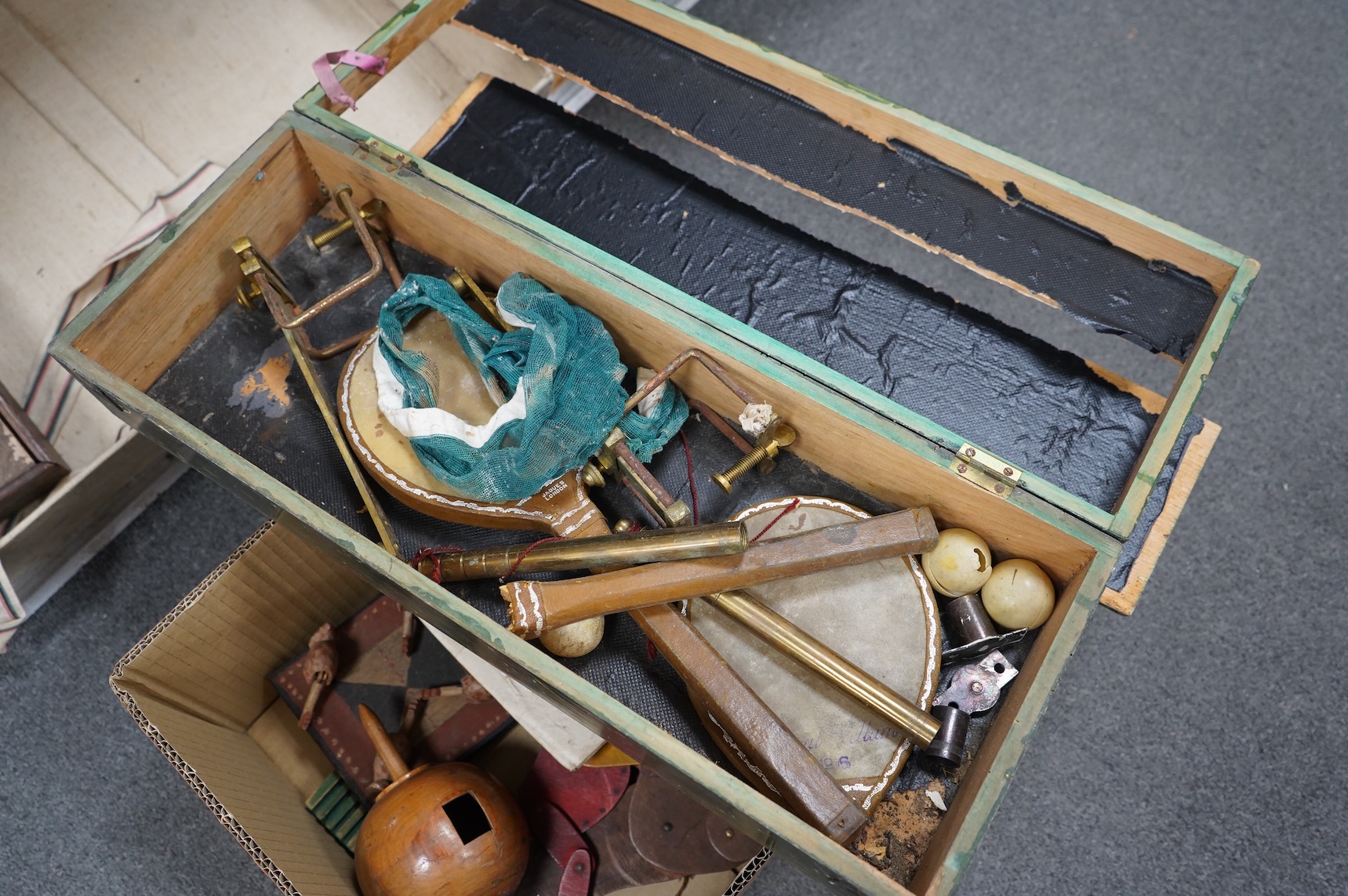 A collection of 19th century toys including; an early Jaques Ping Pong or Gossima set in an illustrated wooden case, a Crandall’s John Gilpin wooden horse with folded linen backed poster, ‘The Adventures of John Gilpin’